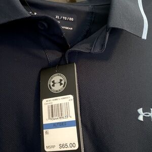 New with tags UA poly. Navy with Columbia Blue trim and logo.